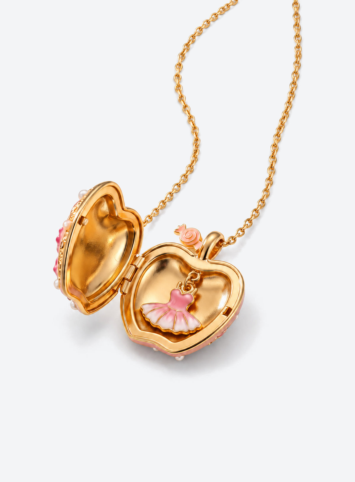 Apple-shaped locket necklace with a colored decorative front and gold-tone chain (Peach Ballet)