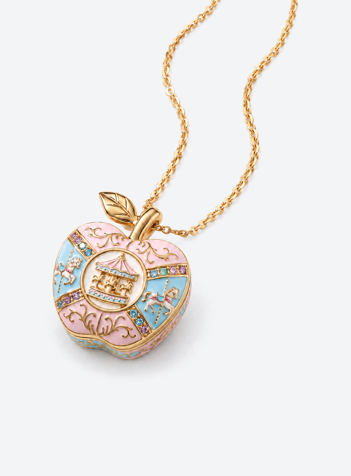 Apple-shaped locket necklace with a colored decorative front and gold-tone chain (Blue Carousel)
