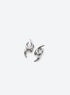 Pair of asymmetric stud earrings with curved points, open cutouts, and a polished silver appearance