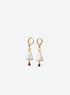 Hoop earrings with triangular baroque pearls, gold-tone stars above and small red garnets below