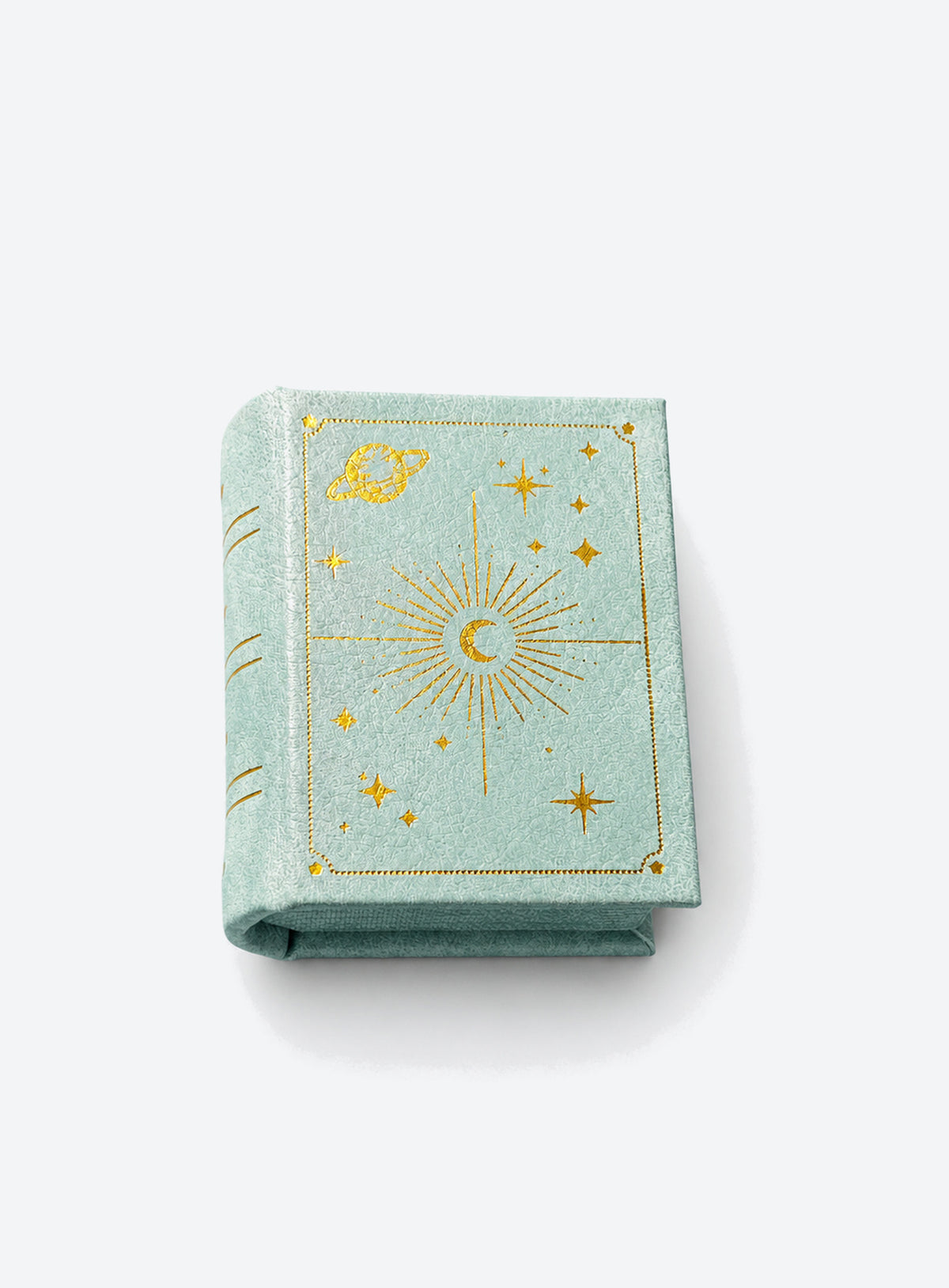 Book-shaped celestial ring box with sun, moon and star details