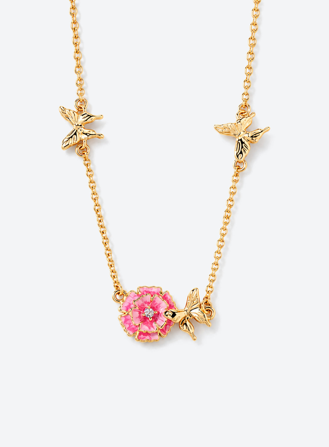 Birth flower necklace with an enamel flower centerpiece and small butterfly accents along the chain (January)