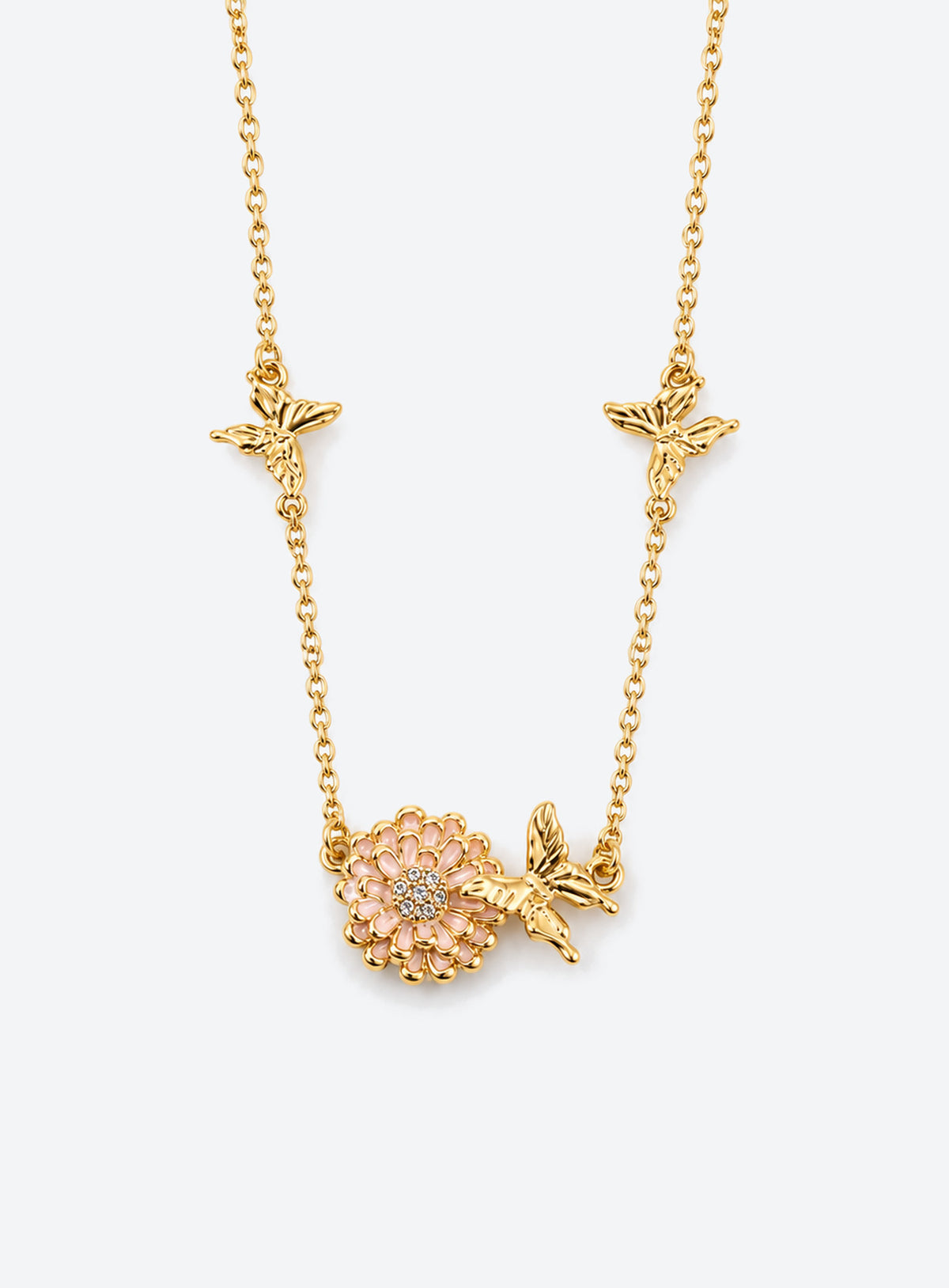 Birth flower necklace with an enamel flower centerpiece and small butterfly accents along the chain (December)