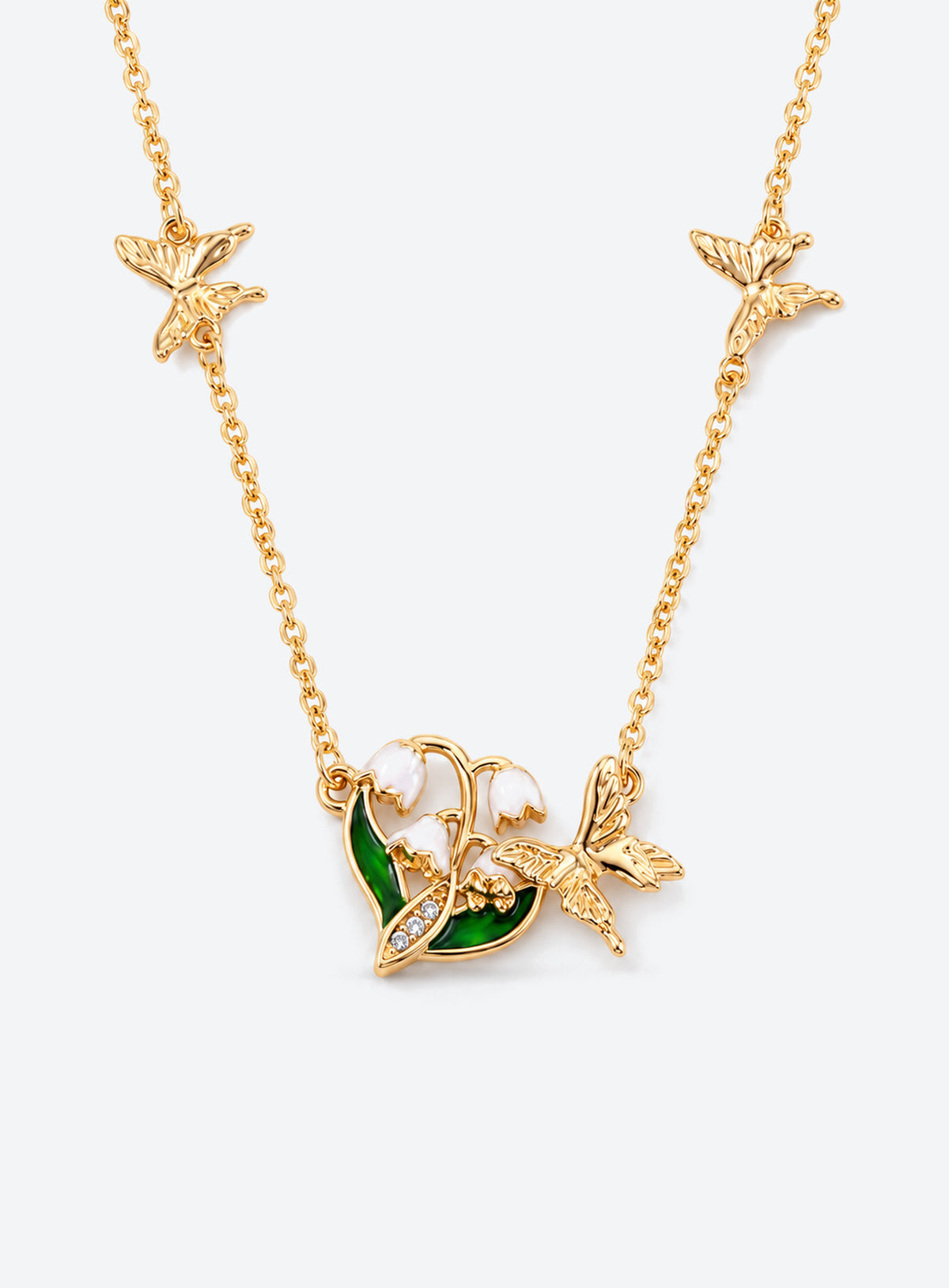 Birth flower necklace with an enamel flower centerpiece and small butterfly accents along the chain (May)