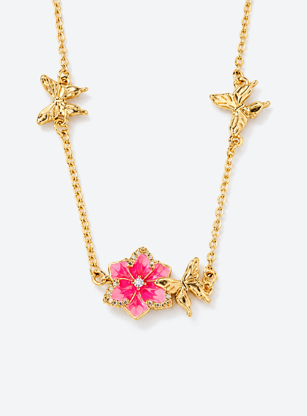 Birth flower necklace with an enamel flower centerpiece and small butterfly accents along the chain (August)