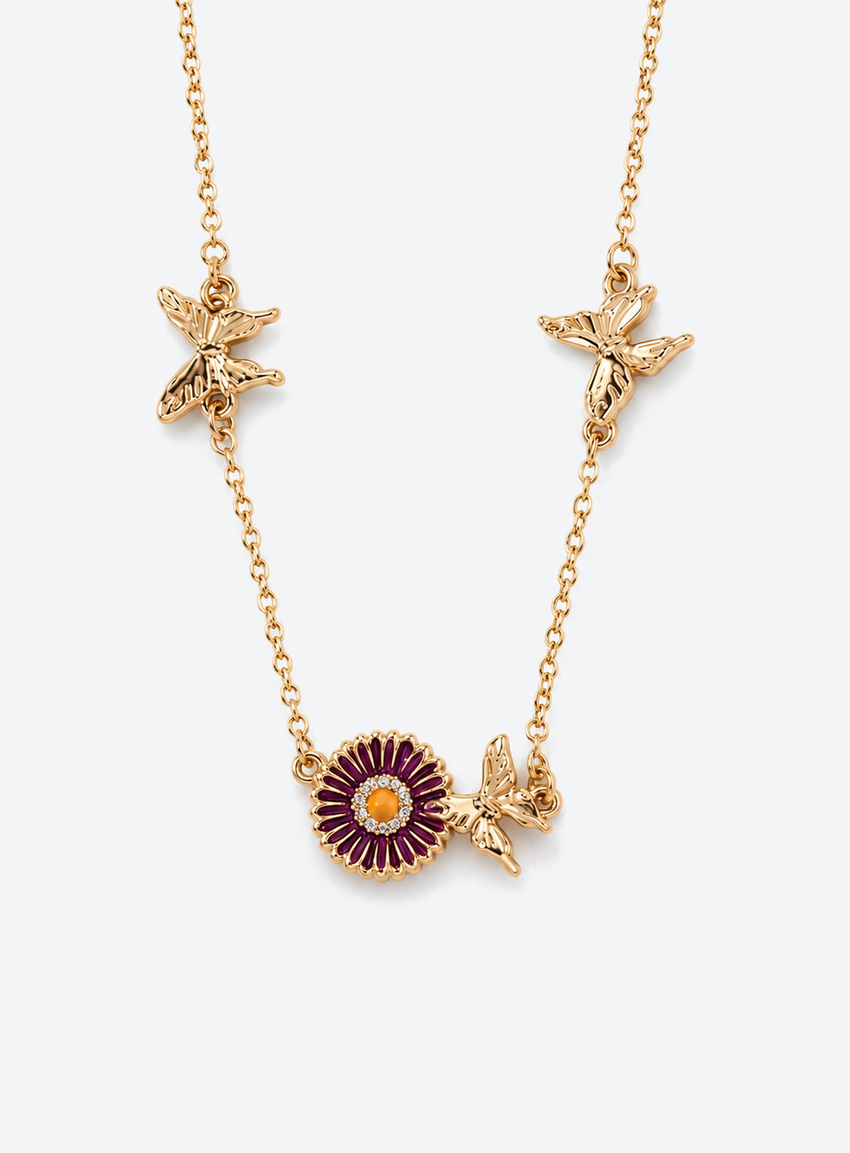 Birth flower necklace with an enamel flower centerpiece and small butterfly accents along the chain (September)