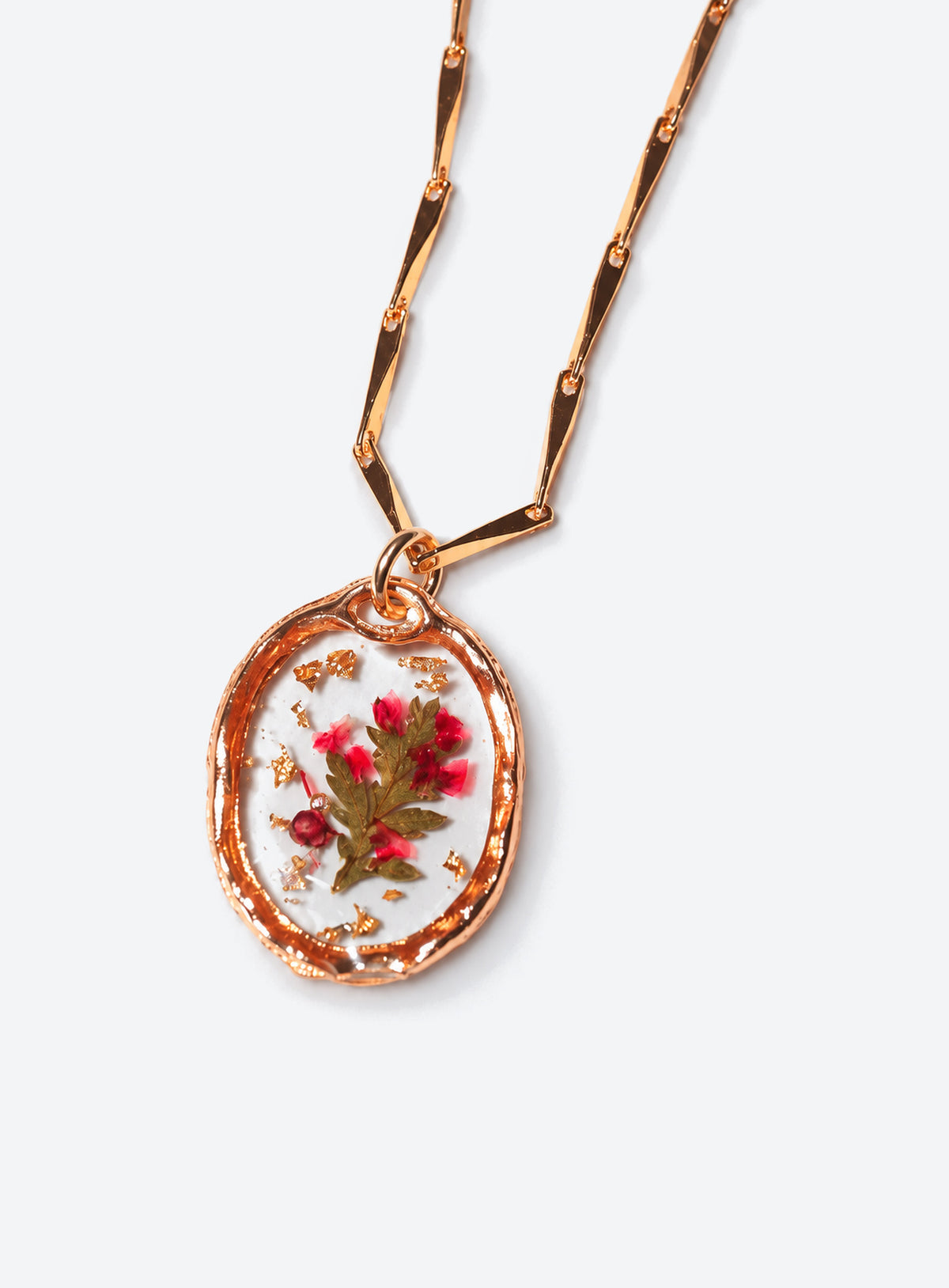 Birth month pressed-flower pendant necklace with a gold paperclip chain (December)