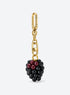 Blackberry bag charm with clustered black and burgundy details and gold-toned hardware