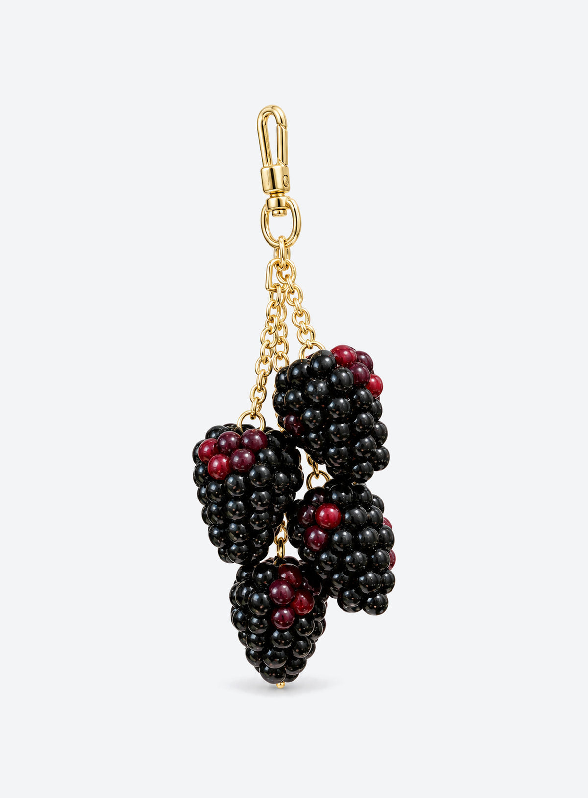 Blackberry bag charm with clustered black and burgundy details and gold-toned hardware