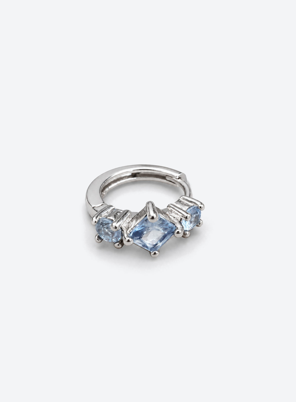 Small hoop earrings with pale blue round and diamond-shaped stones