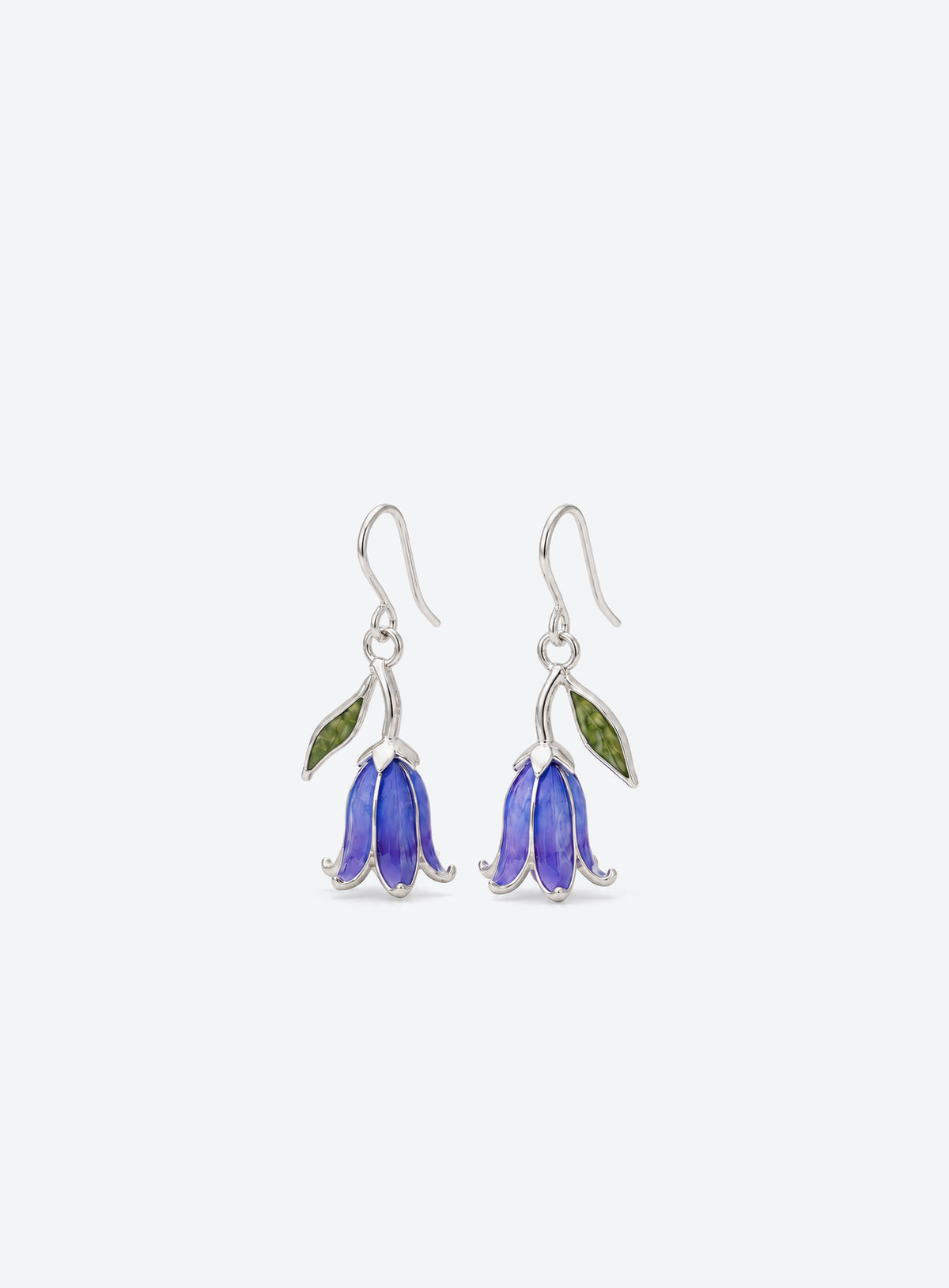 Blue and purple bell-shaped flower drop earrings with green leaves and silver-tone hooks