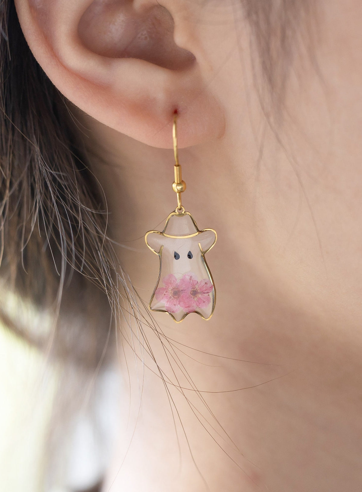 Cowboy ghost earrings with pink flower details