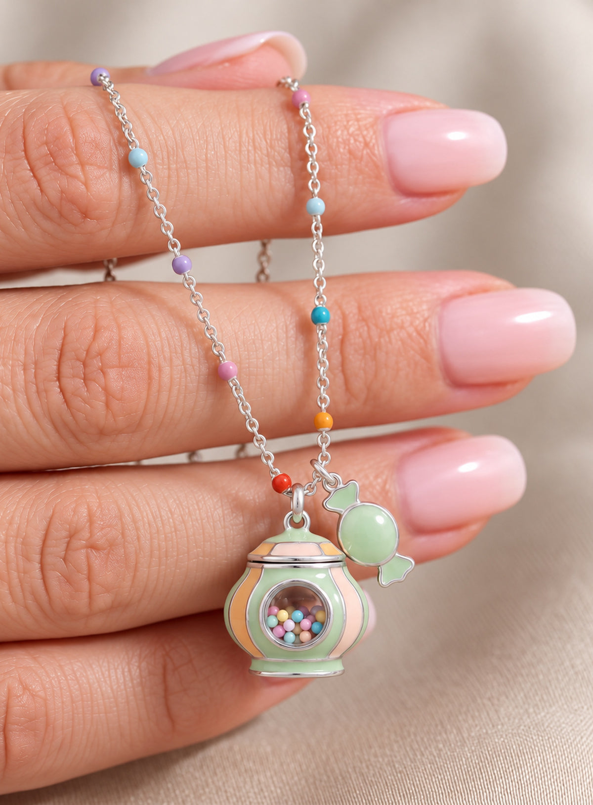Candy-themed pendant necklace with a transparent window containing colorful candy-like beads (Mint Candy Jar)