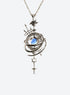 Armillary sphere pendant with nested rings, a blue center stone, celestial markings, and dangling stars