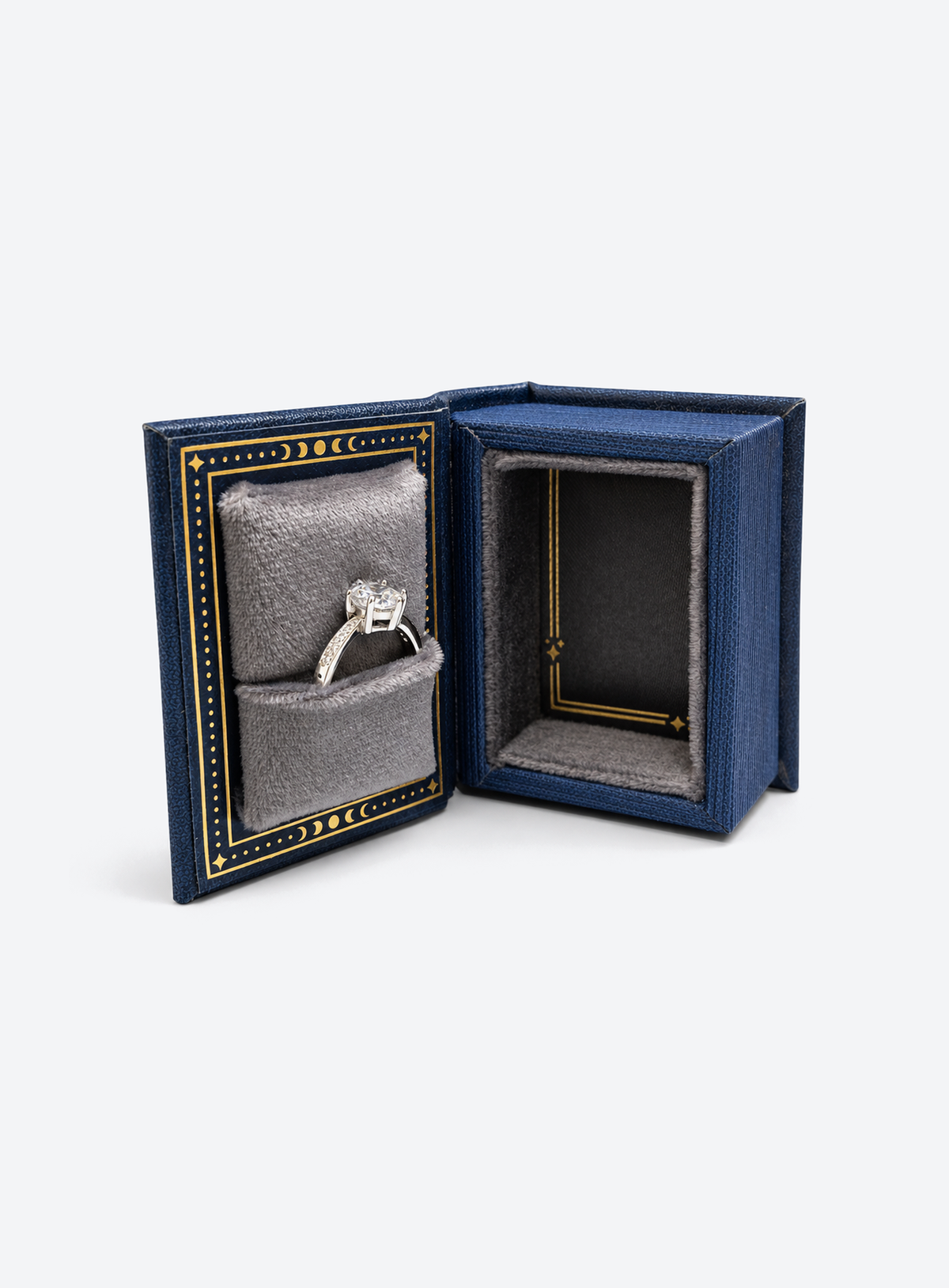 Book-shaped celestial ring box with sun, moon and star details