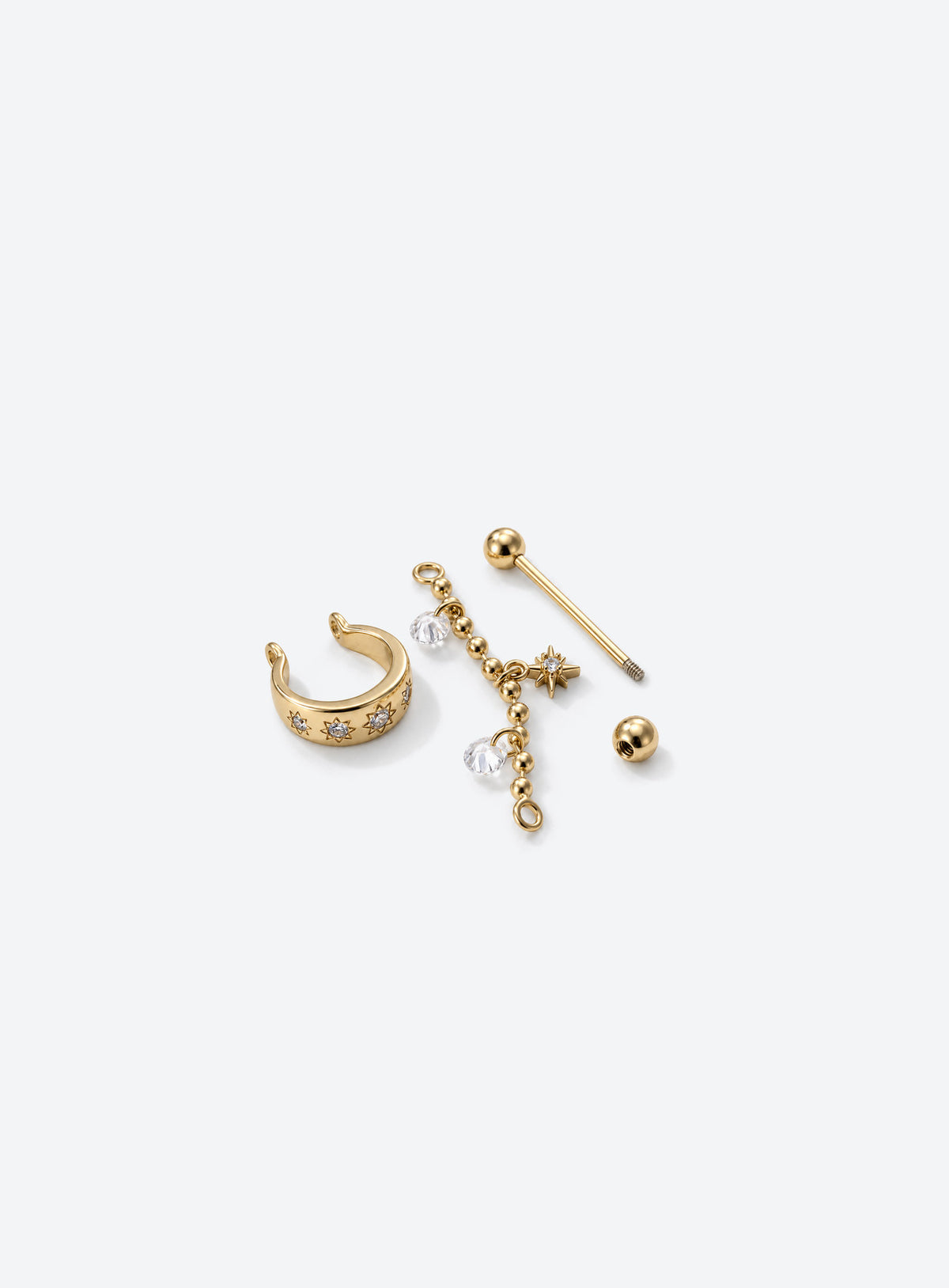 Curved celestial cartilage stud with star motifs, a beaded chain, two clear stone drops, and a dangling star