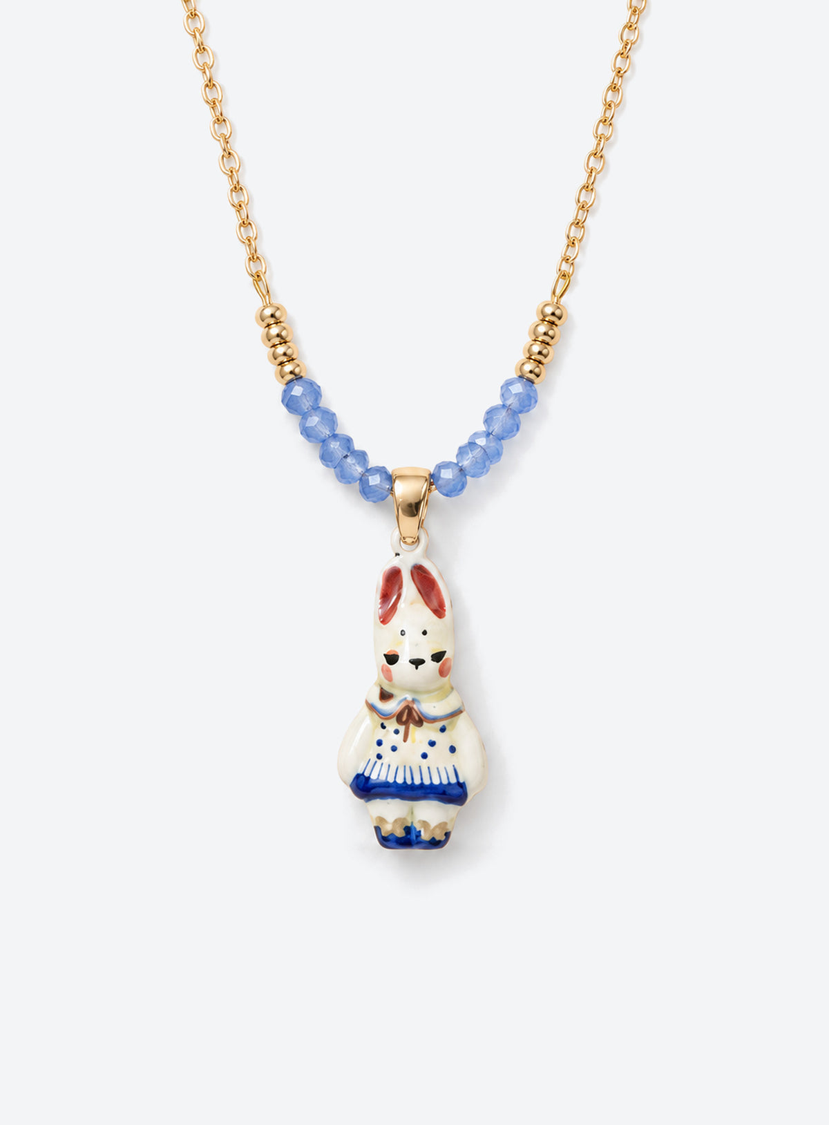 Hand-painted ceramic animal pendant necklace with gold-tone detailing and small colored beads on a delicate chain (Blue Rabbit)