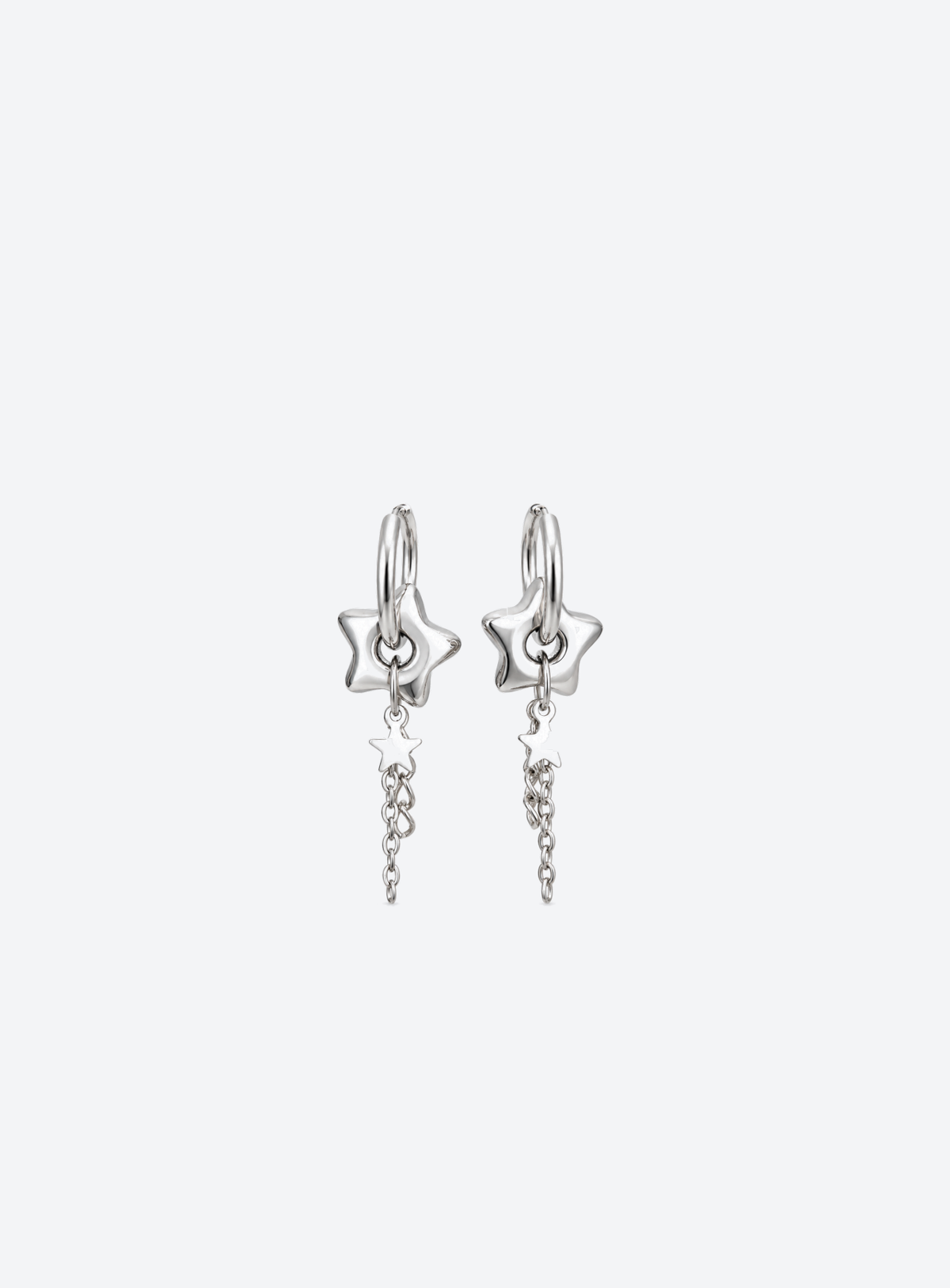 Silver-tone chunky star hoop earrings with small star charms and chain tassels
