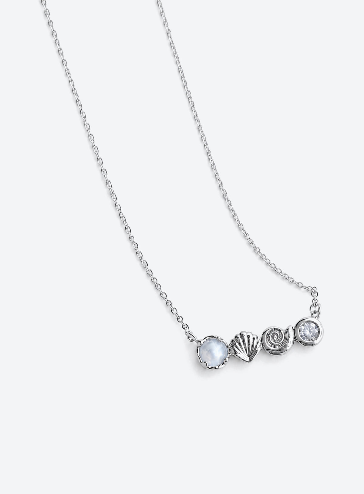 Delicate necklace with conch and scallop shell charms, a faux pearl and clear accents (Silver)