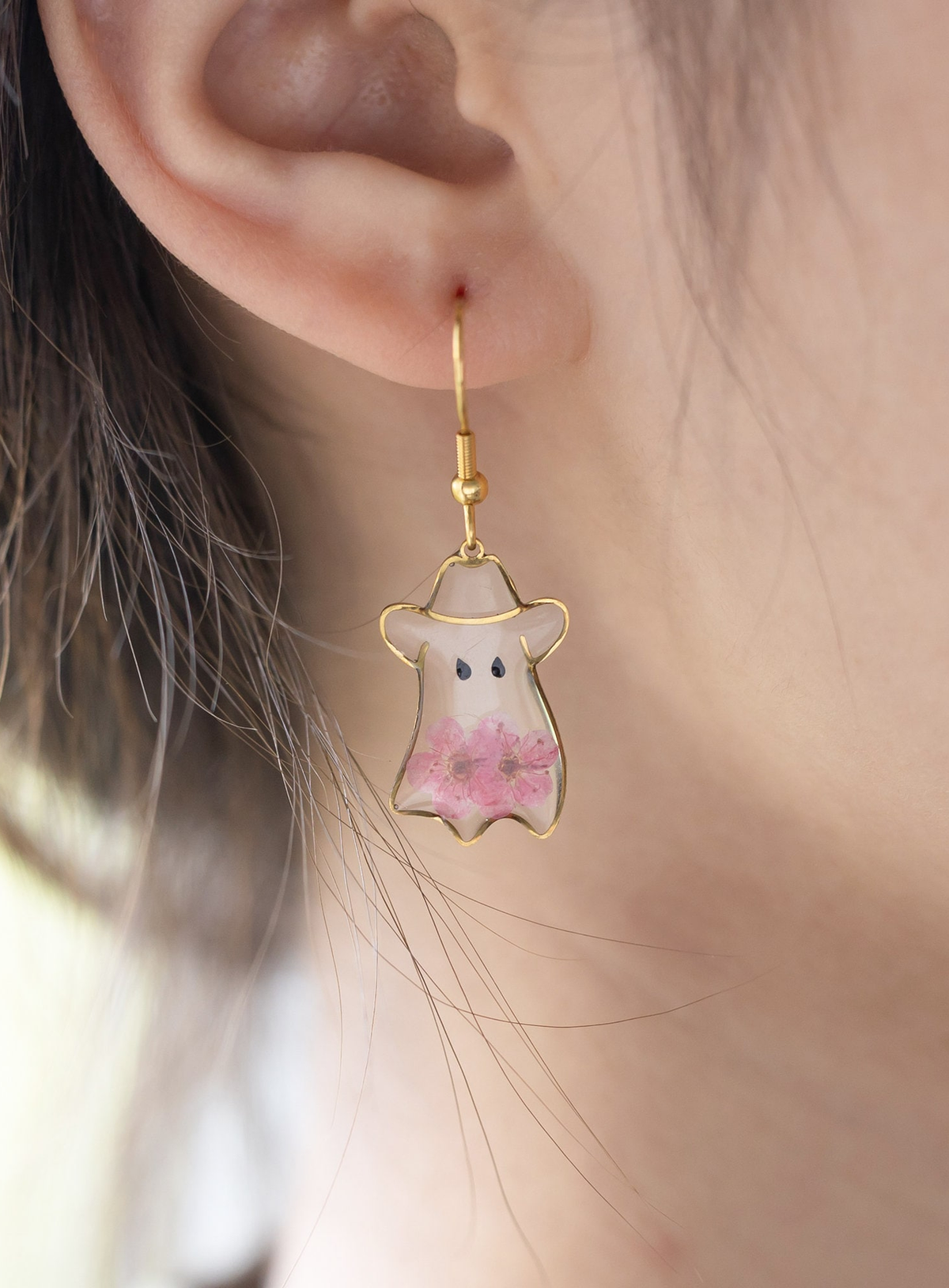 Cowboy ghost earrings with pink flower details