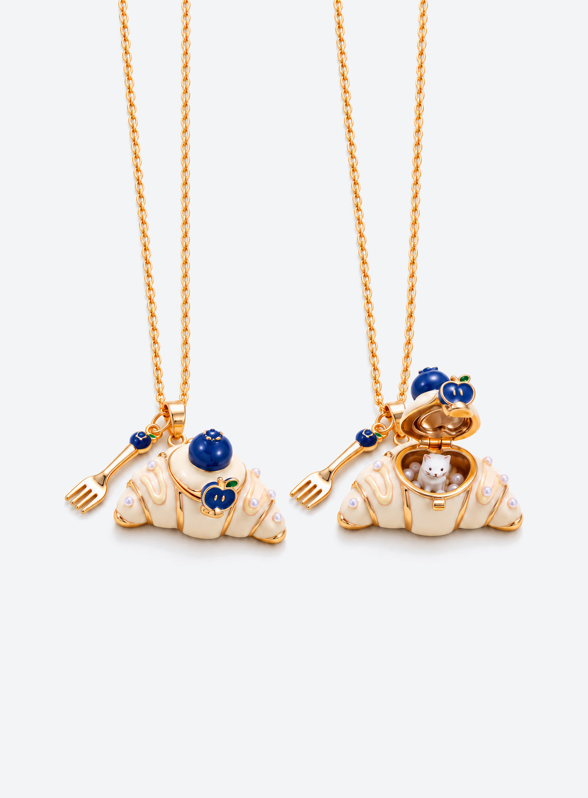 Croissant-shaped enamel locket necklace with an animal figurine inside, a fine chain, and a small cutlery charm (Cat)