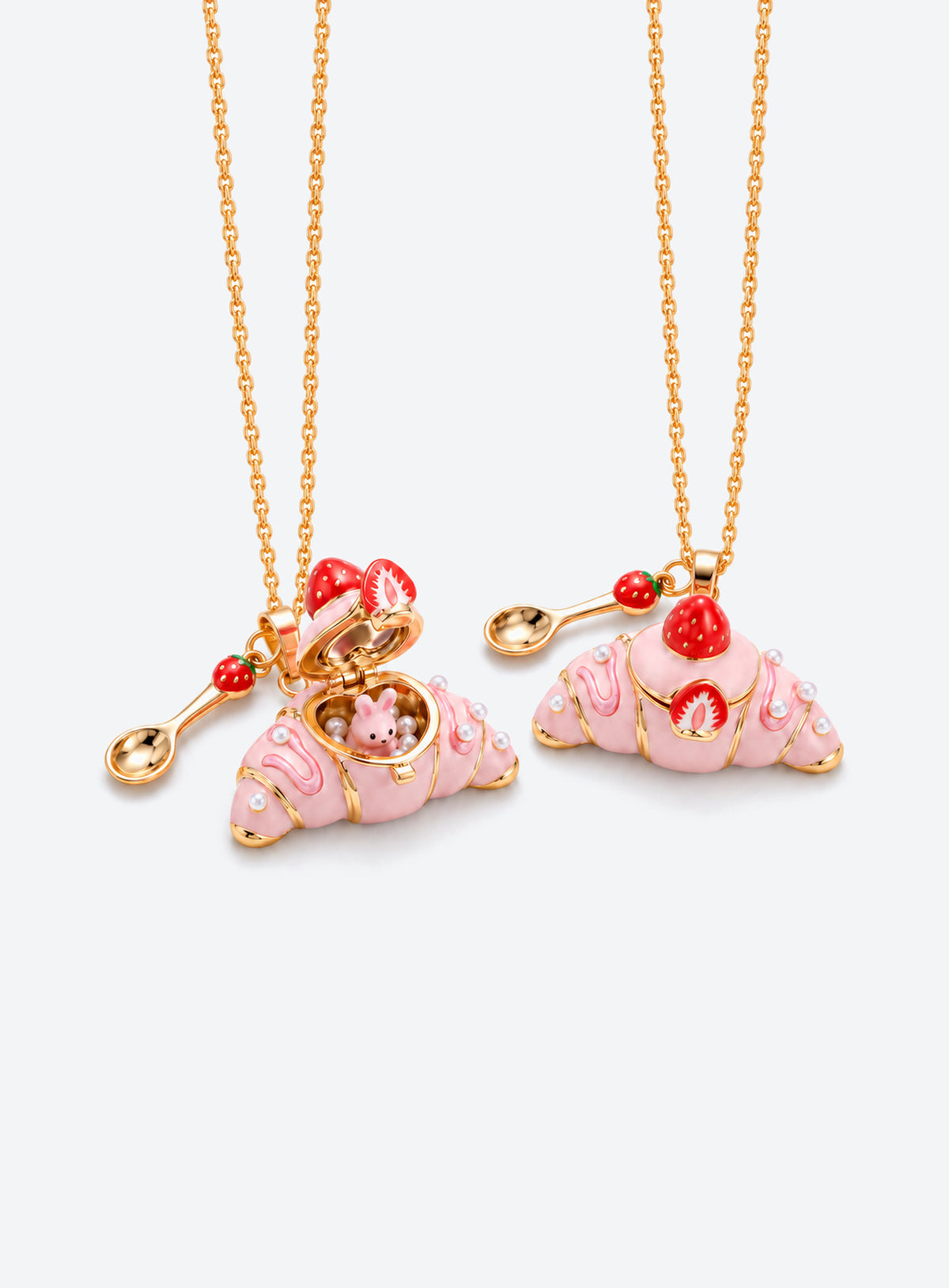 Croissant-shaped enamel locket necklace with an animal figurine inside, a fine chain, and a small cutlery charm (Rabbit)