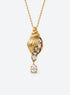Ocean pendant necklace with a textured gold-tone surface, clear crystal accents and a hanging teardrop crystal (Conch Shell)