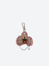 Orchid shaped bag charm with silver tone rings and hanging chains