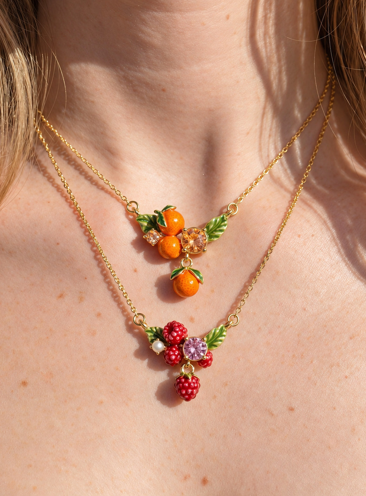 Colorful enamel fruit pendant necklace with crystal accents and leaf details