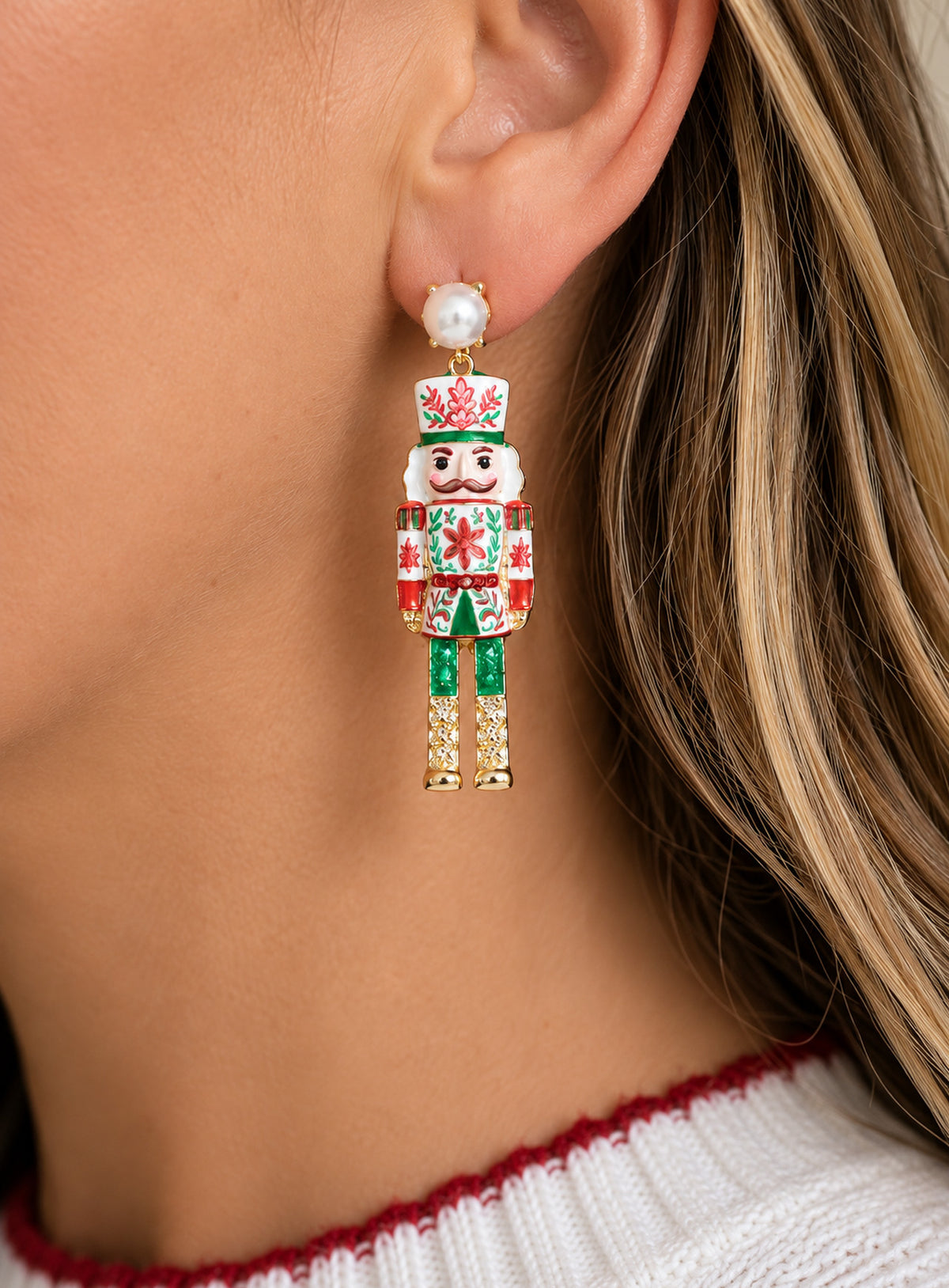 Nutcracker drop earrings with red and green enamel, rhinestone details and pearl-like studs