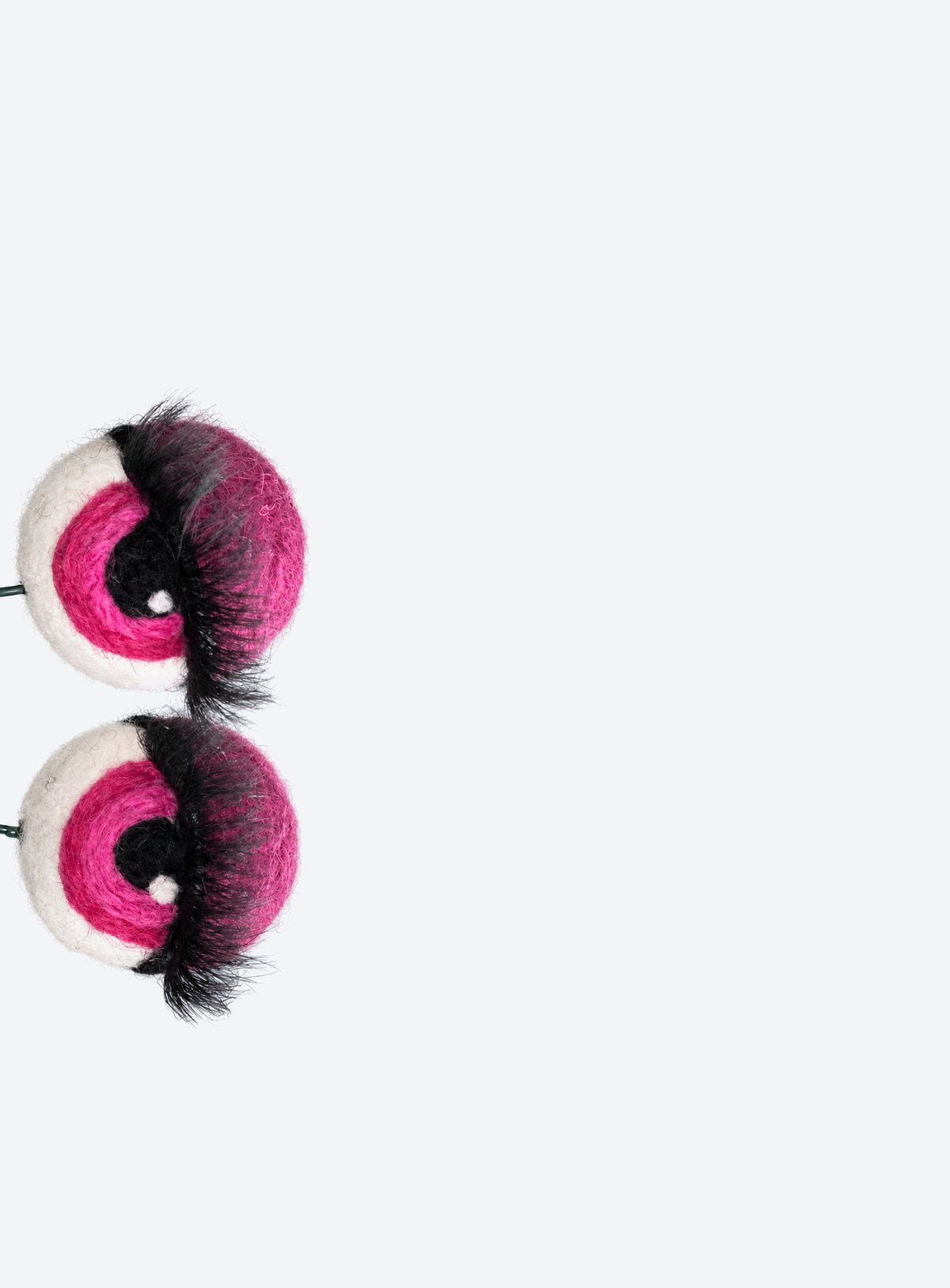 Felt eyeball plant stakes with colorful eyeshadow, eyelashes, and floral wire stems