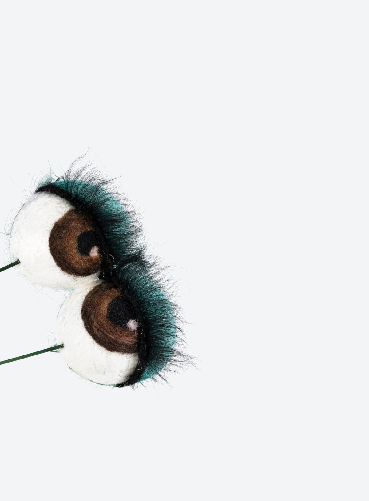 Felt eyeball plant stakes with colorful eyeshadow, eyelashes, and floral wire stems