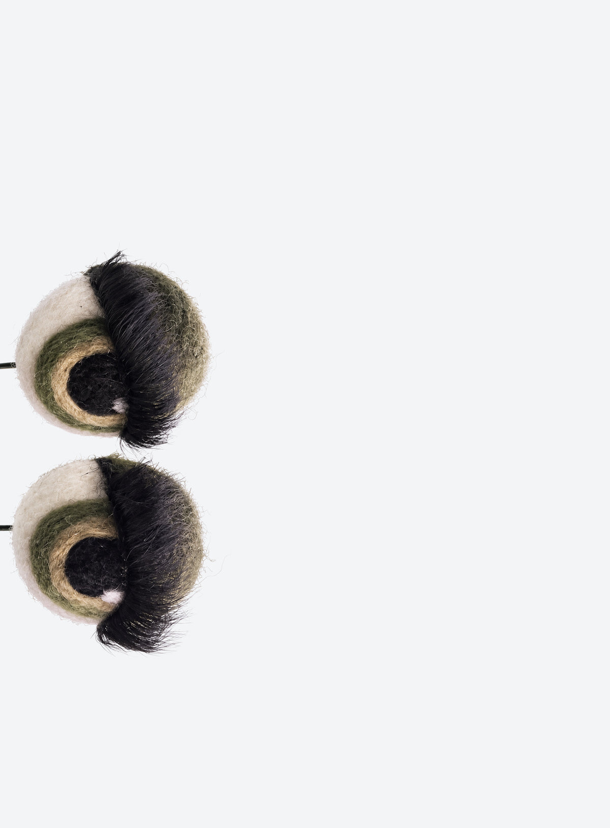 Felt eyeball plant stakes with colorful eyeshadow, eyelashes, and floral wire stems