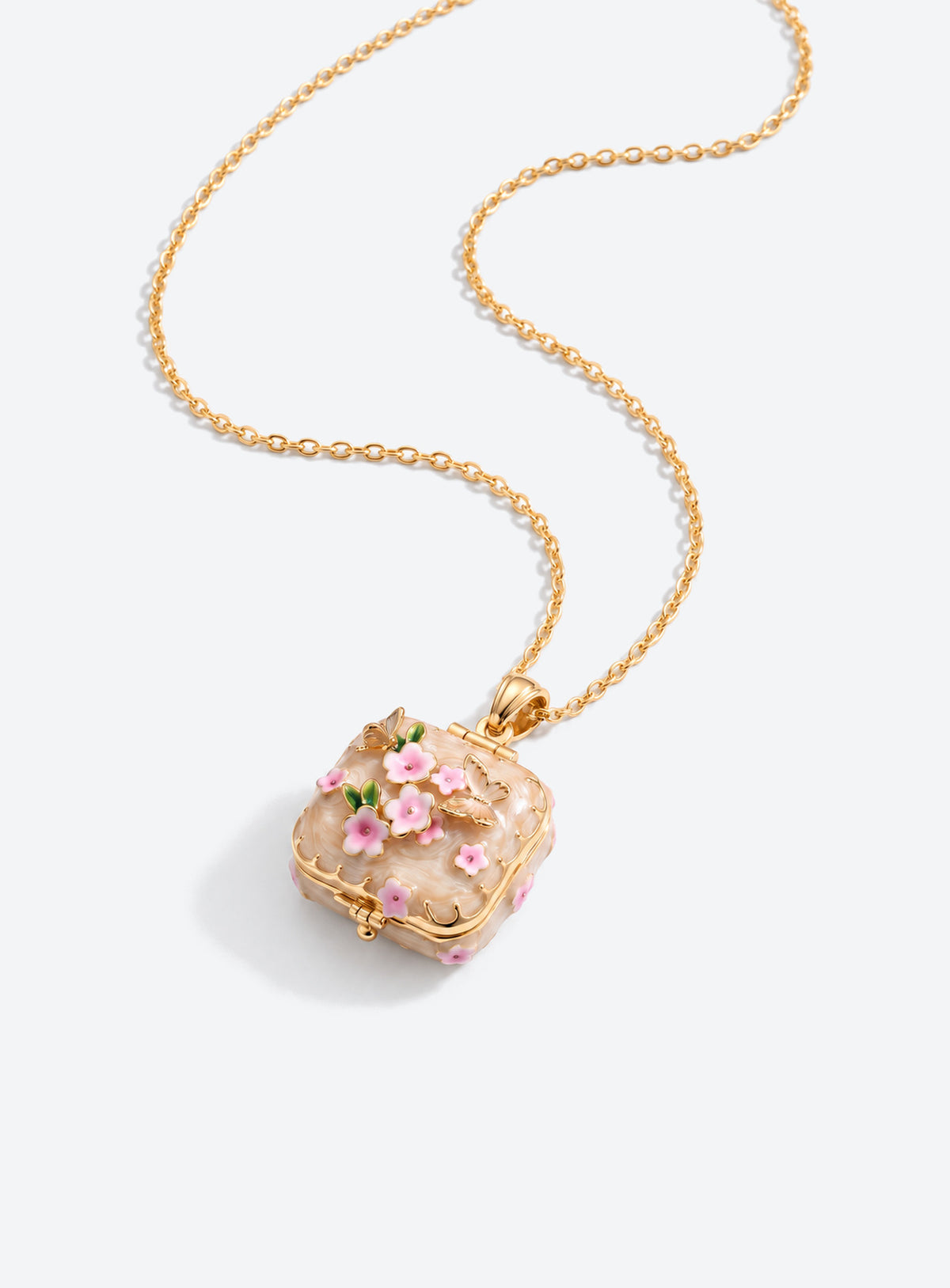 Square locket necklace with raised flowers, butterfly details, and gold-tone trim (Beige)
