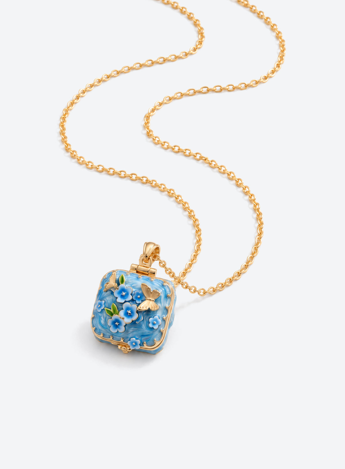 Square locket necklace with raised flowers, butterfly details, and gold-tone trim (Blue)