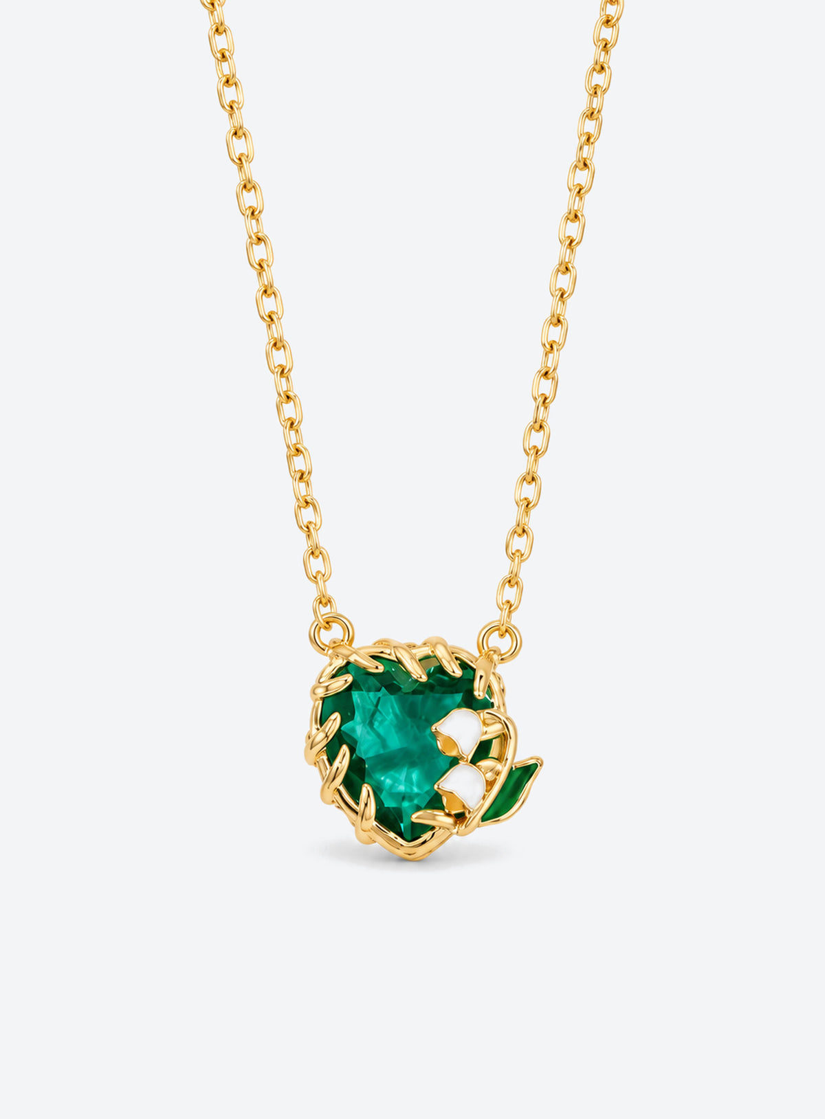 Heart-shaped crystal pendant necklace with enameled floral details and a gold-tone vine frame (May)