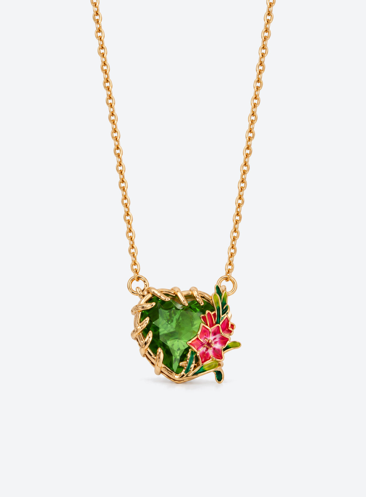 Heart-shaped crystal pendant necklace with enameled floral details and a gold-tone vine frame (August)