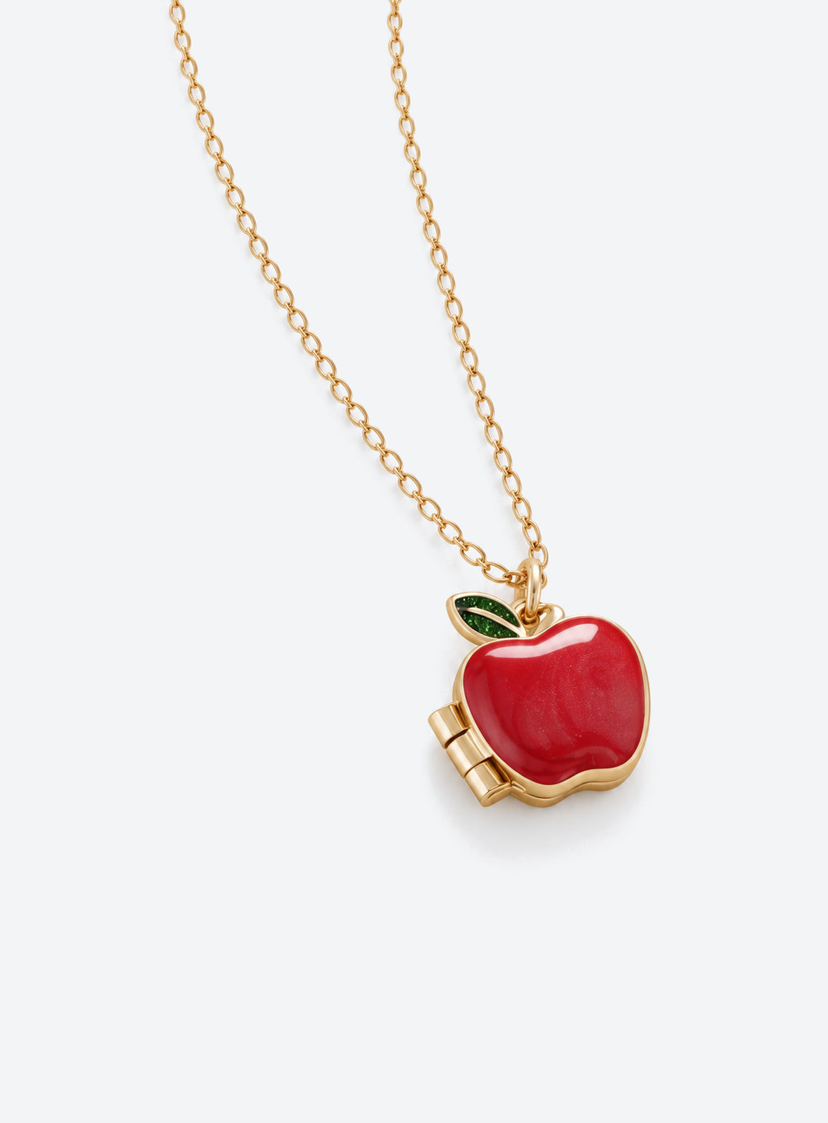 Fruit locket necklace in pear, red strawberry with raised seeds, or red apple with a green leaf styles (Apple)