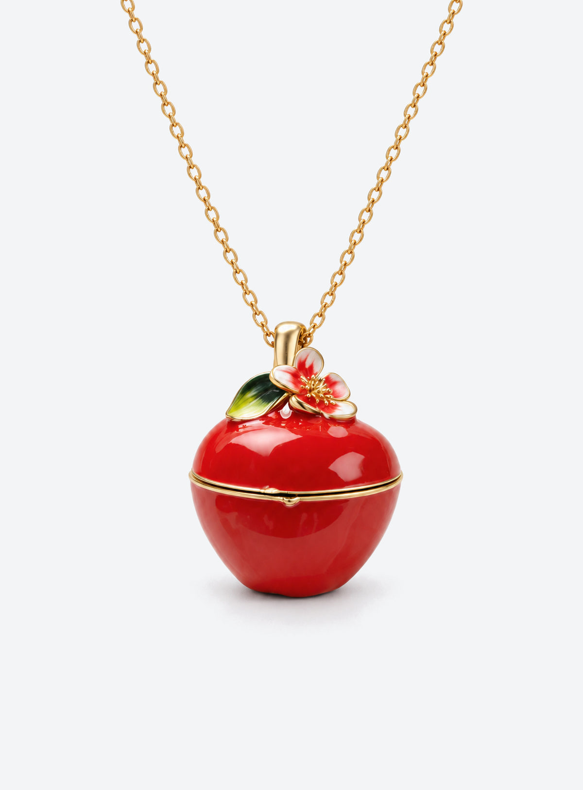 Fruit-shaped locket necklace with glossy enamel, gold-tone details, and a tiny mouse inside (Apple)