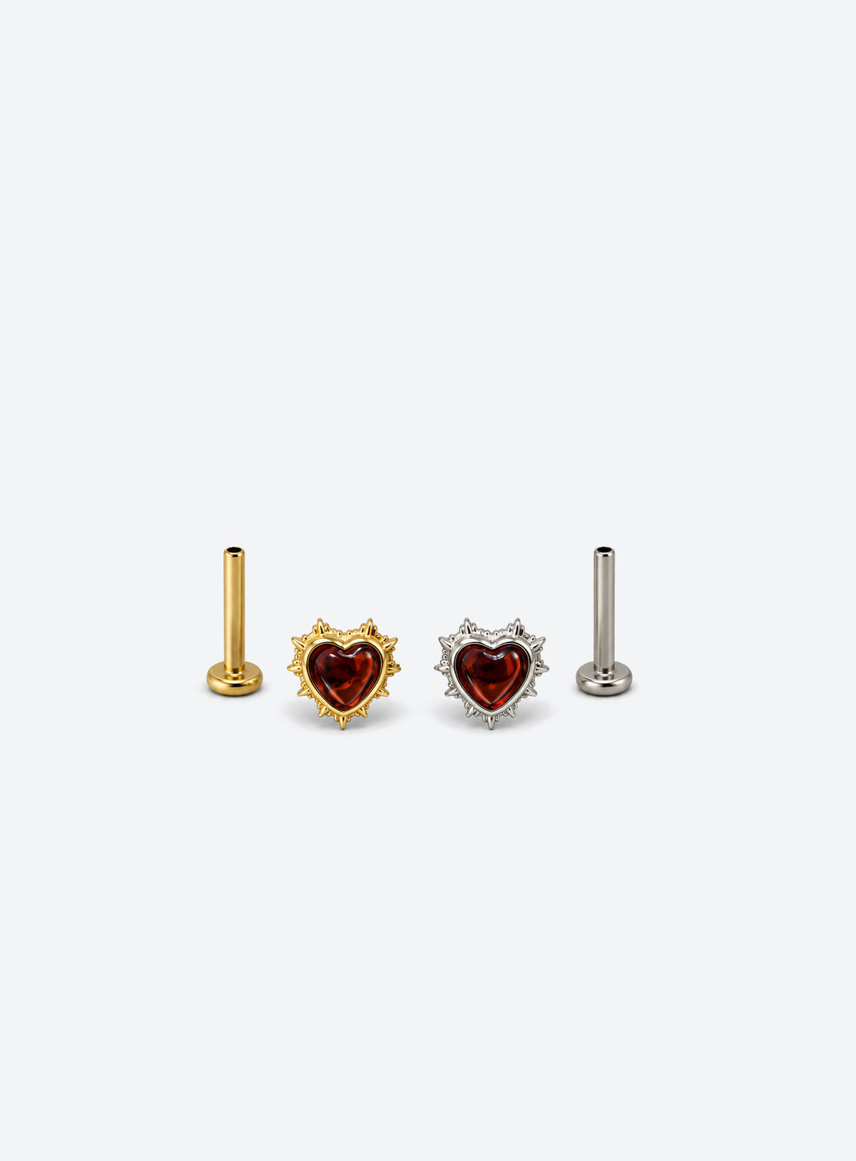 Heart-shaped red garnet flat-back stud with a sculpted metal setting