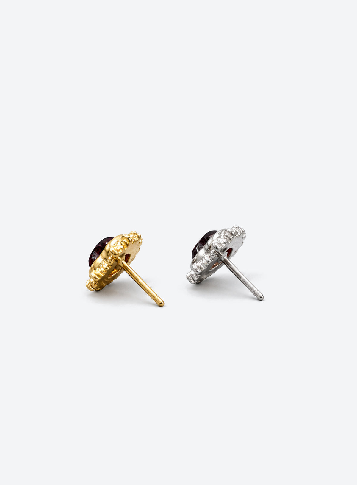 Heart-shaped red garnet flat-back stud with a sculpted metal setting