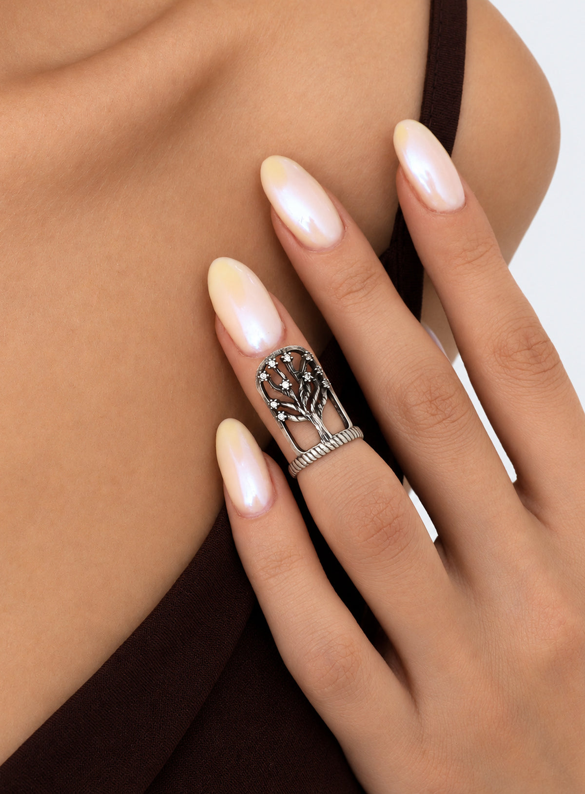 Silver-tone gothic nail ring with an adjustable band and decorative front (Tree)