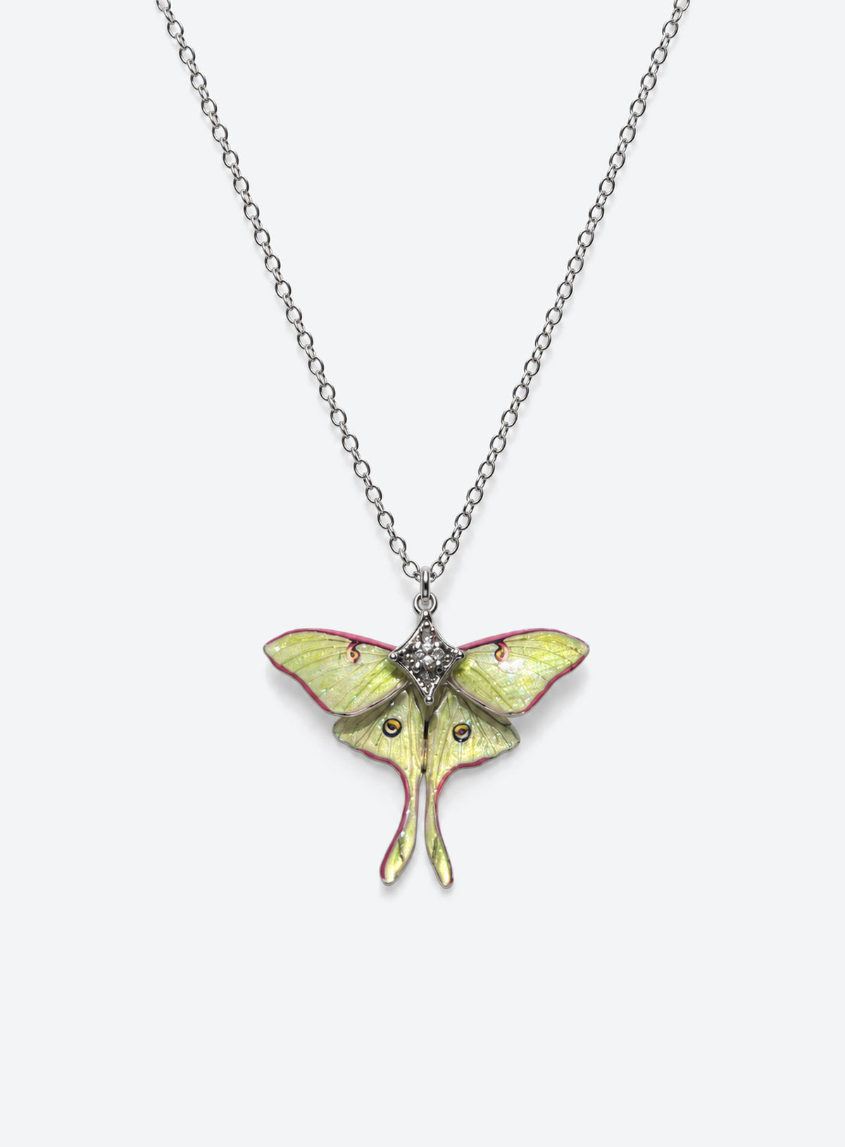 Pearlescent green luna moth pendant with painted wing details, two long tails, and clear body rhinestones