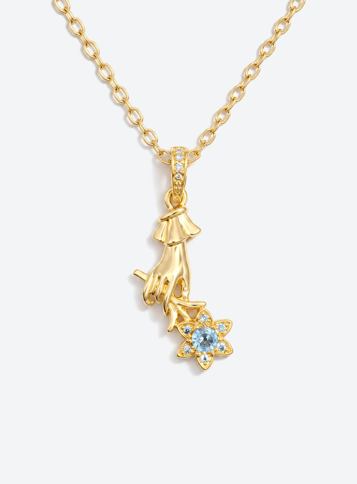 Necklace with a sculpted hand pendant holding a floral bouquet with crystal accents (March)