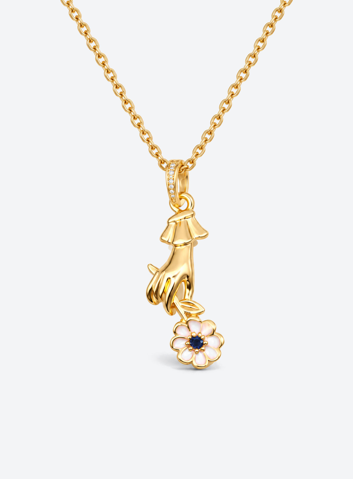 Necklace with a sculpted hand pendant holding a floral bouquet with crystal accents (April)