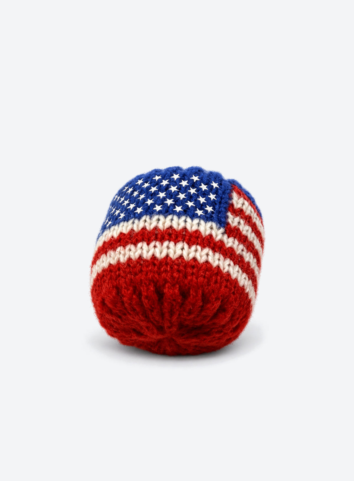 Cotton crochet footbag with visible yarn stitches and a textured, rounded shape