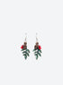 Drop earrings with green holly leaves, red berry beads, bronze-tone pinecones and silver-tone ball-hook ear wires.