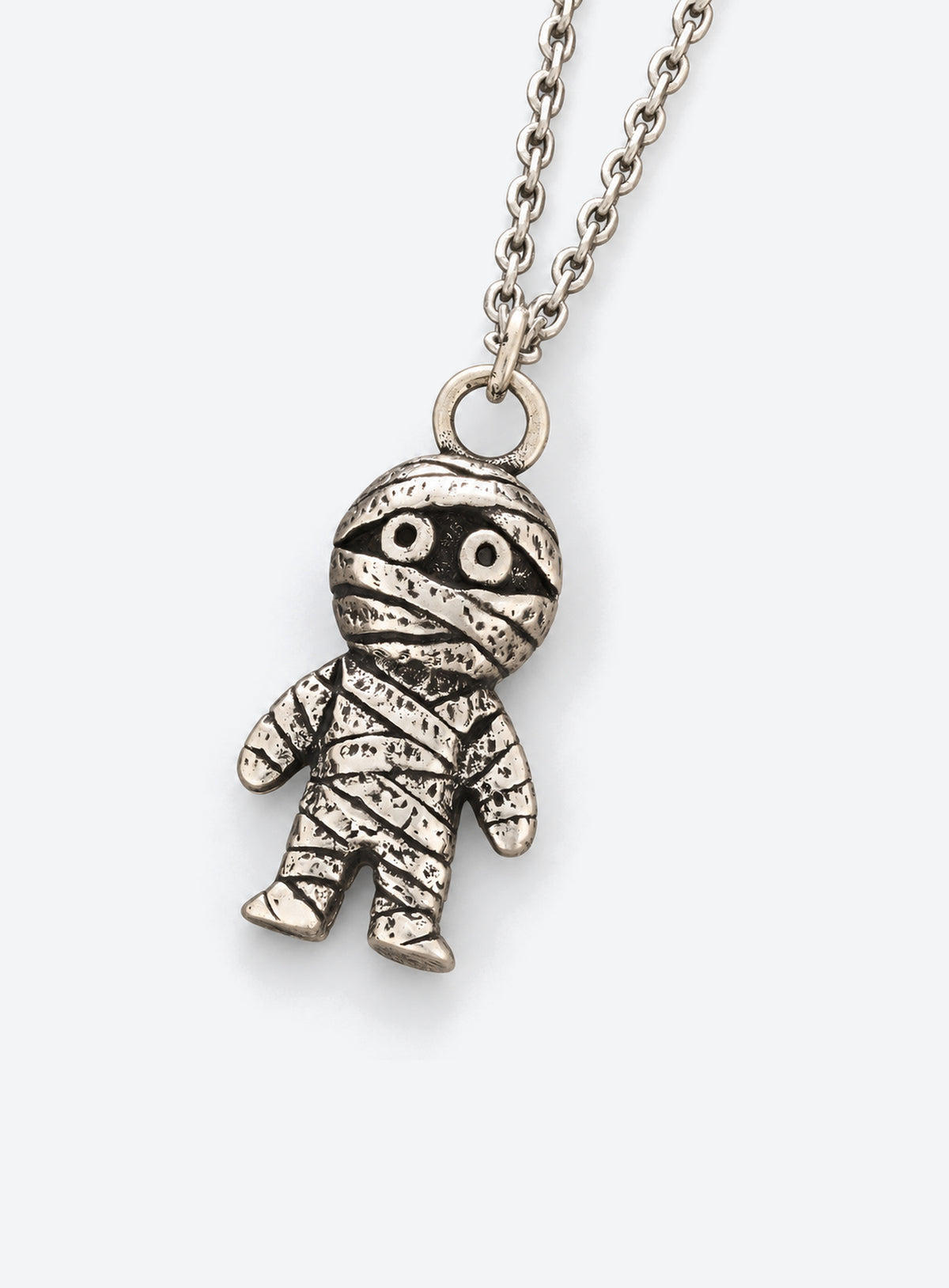 Vintage silver mummy pendant necklace with bandage details
