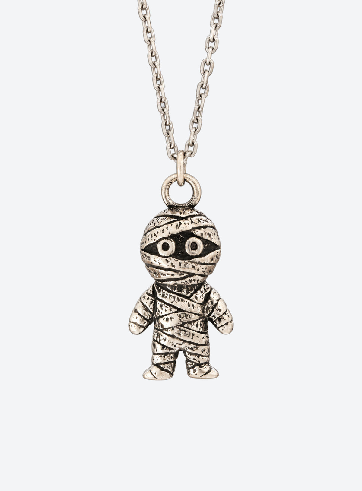 Vintage silver mummy pendant necklace with bandage details