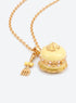 Cake-shaped enamel locket necklace with gold-tone trim and chain, plus a miniature cutlery charm (Yellow)